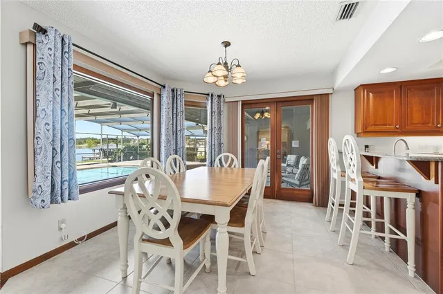 a spacious bathroom with a granite countertop sink mirror and toilet