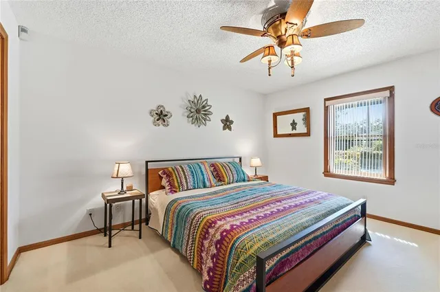 a view of a swimming pool with a deck