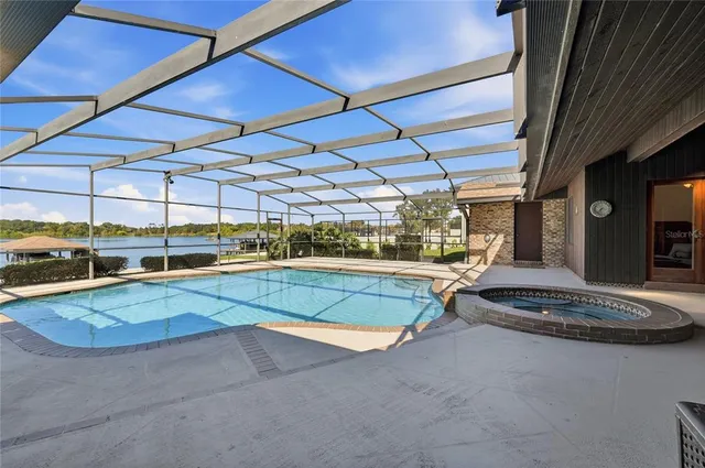 a view of a lake with a big yard