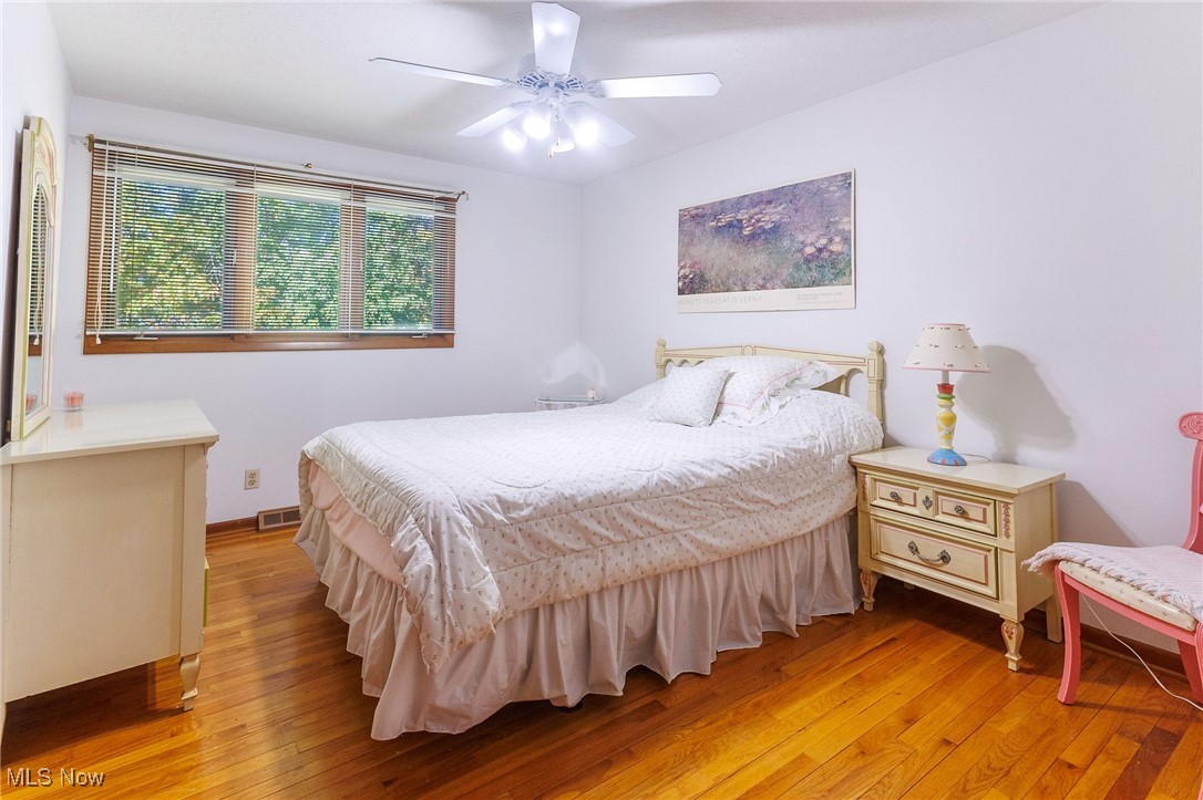 966 Brainard Road Cleveland, OH 44143 - Photo 34 of 50 Bedroom with light hardwood / wood-style flooring and ceiling fan