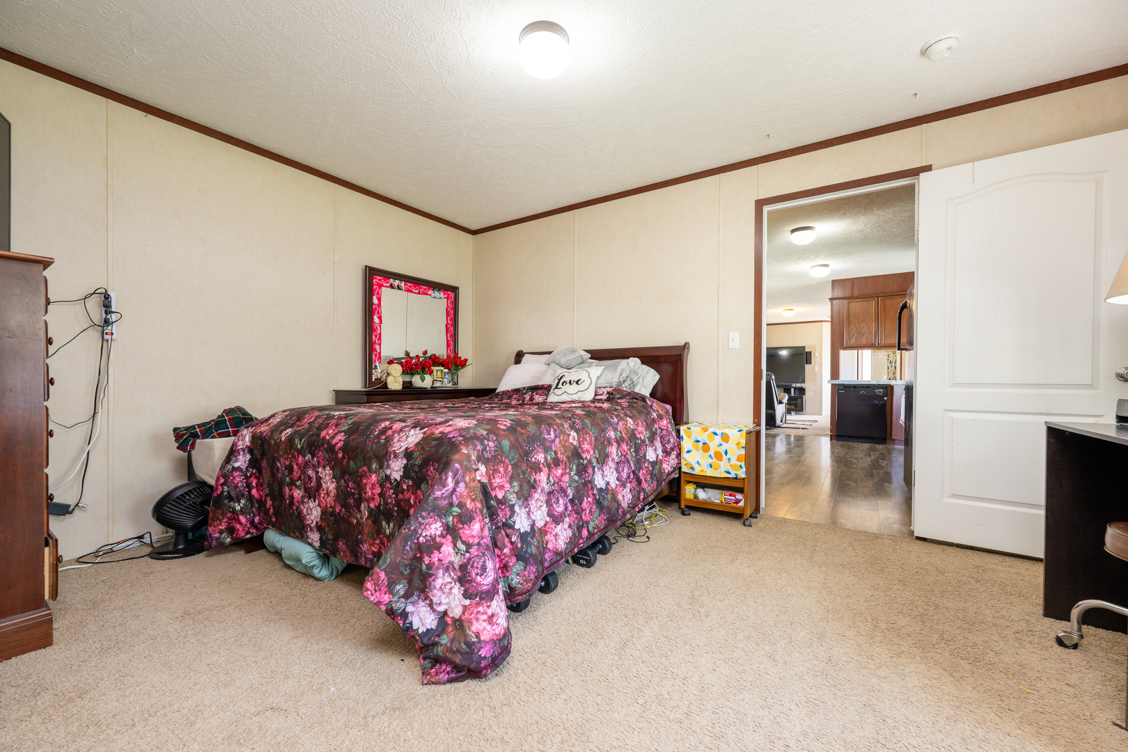4809 West Windsor Road, Unit G22 Champaign, IL 61822 - Photo 12 of 22 a bedroom with a bed and a cabinets