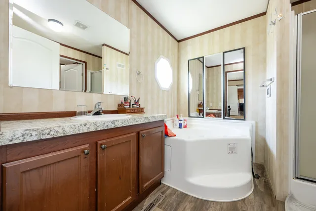 a bathroom with a sink and a mirror