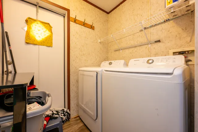 a utility room with dryer and washer