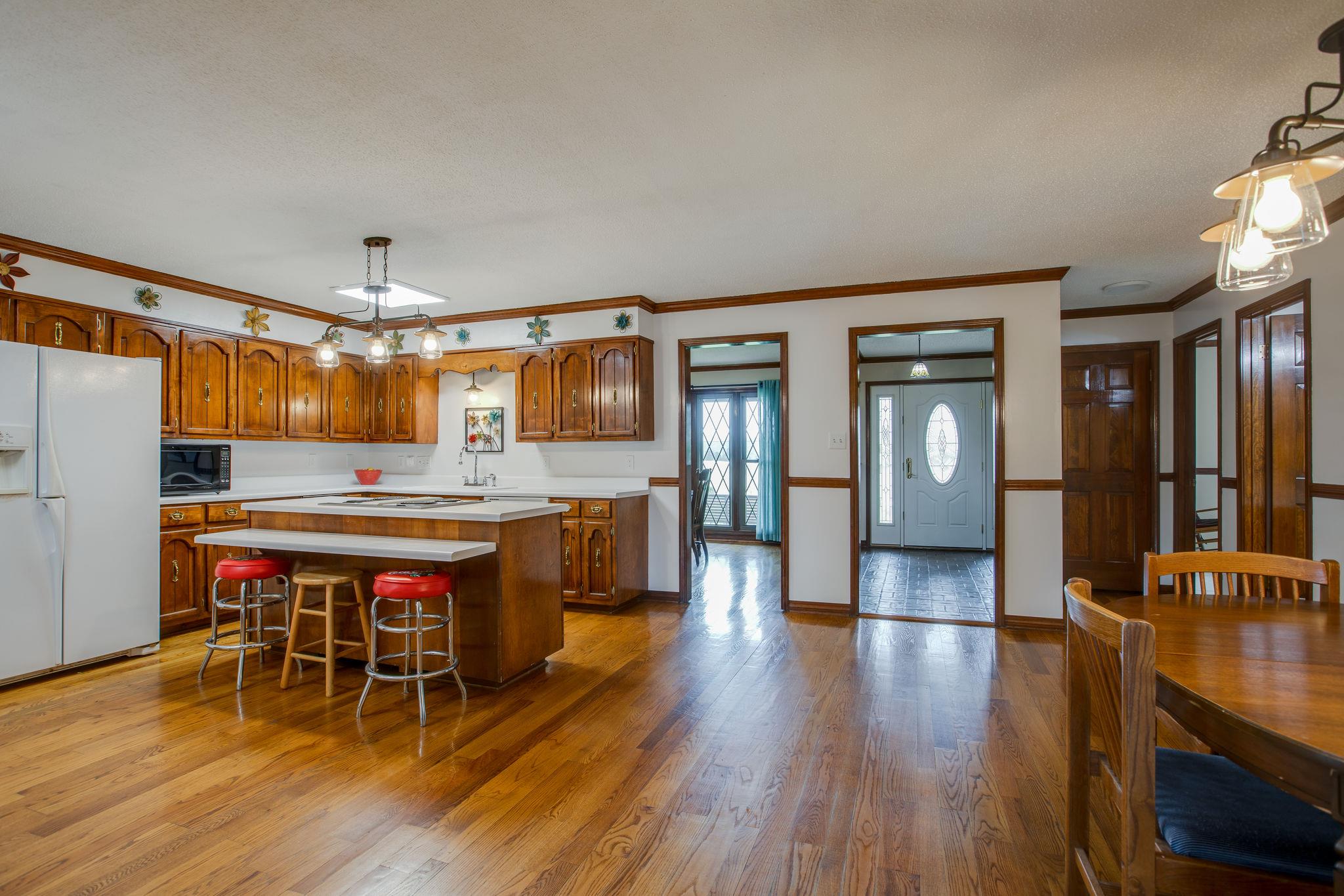 3013 Greens Mill Road Spring Hill, TN 37174 - Photo 8 of 30 View of the kitchen looking back toward the foyer and dining room. This space is what you dream about.