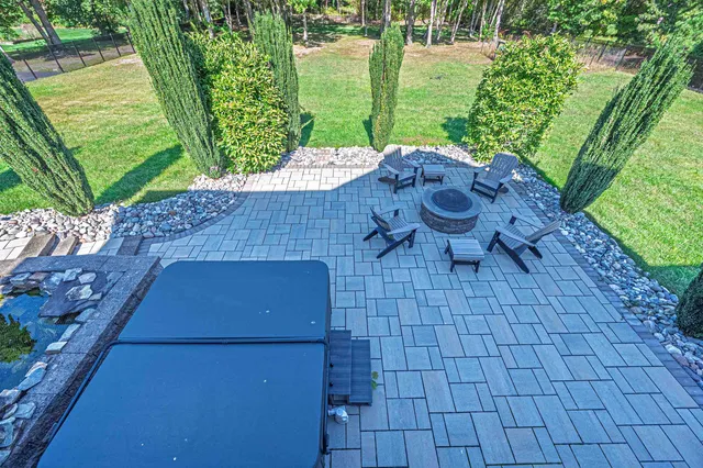 a view of a backyard with plants