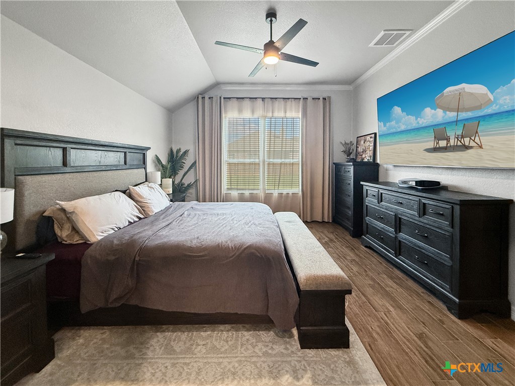 6123 Parma Lane Temple, TX 76502 - Photo 20 of 44 a bedroom with a bed and a large window