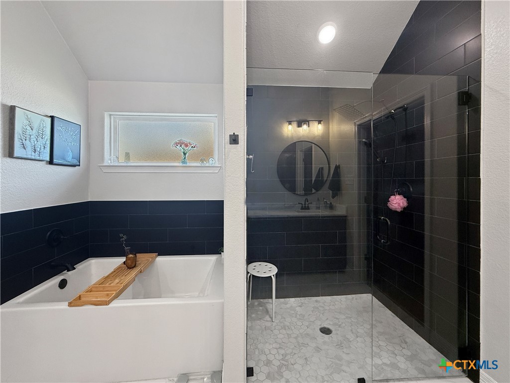 6123 Parma Lane Temple, TX 76502 - Photo 29 of 44 a bathroom with a sink a vanity and a mirror