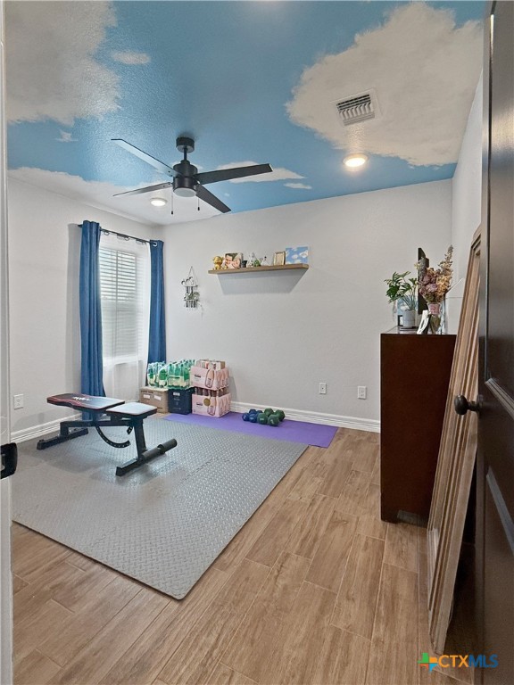 6123 Parma Lane Temple, TX 76502 - Photo 35 of 44 a living room with furniture a window and a flat screen tv