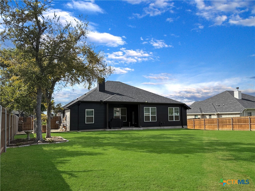6123 Parma Lane Temple, TX 76502 - Photo 39 of 44 a front view of a house with a garden