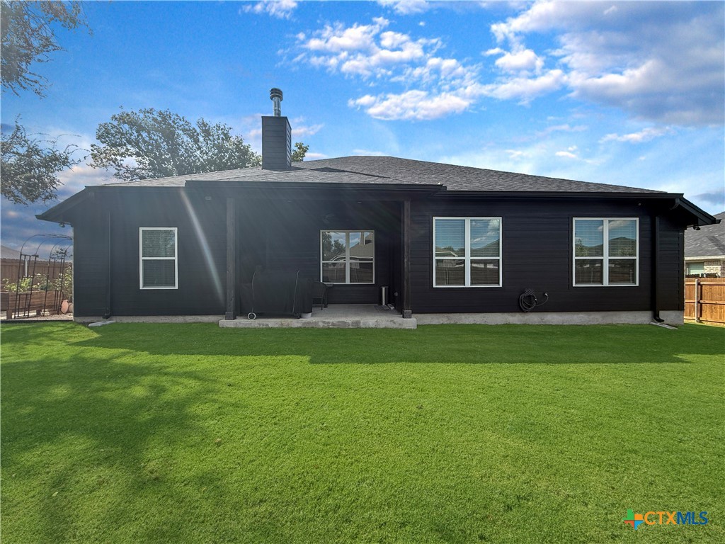 6123 Parma Lane Temple, TX 76502 - Photo 40 of 44 a front view of a house with a garden