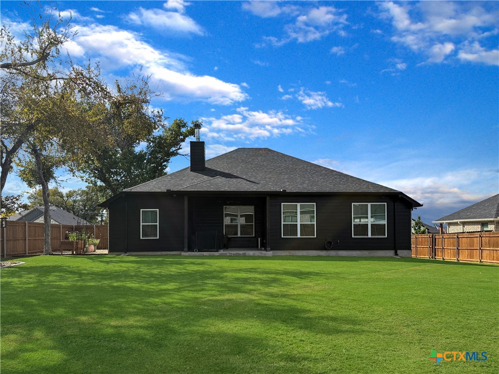 6123 Parma Lane Temple, TX 76502 - Photo 41 of 44 a front view of a house with a garden