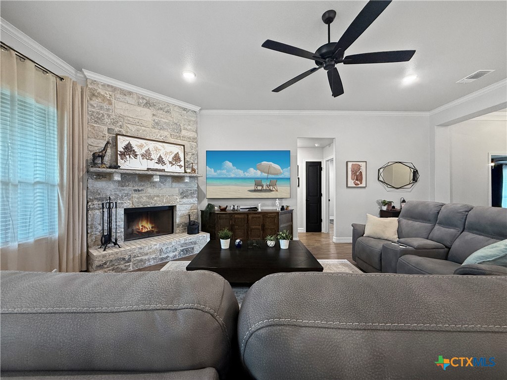 6123 Parma Lane Temple, TX 76502 - Photo 10 of 44 a living room with furniture and a fireplace