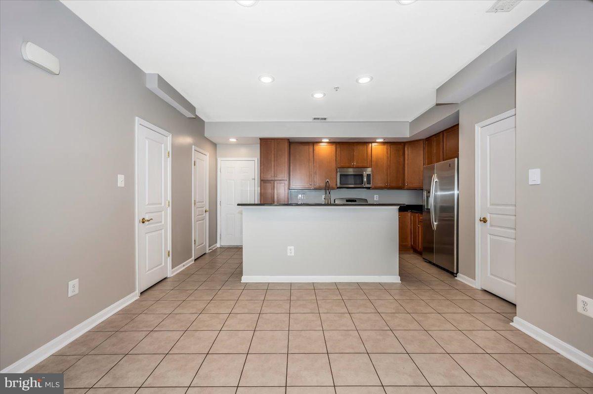 1806 Monocacy View Circle, Unit 41A Frederick, MD 21701 - Photo 11 of 59 a view of a kitchen with a sink and cabinets