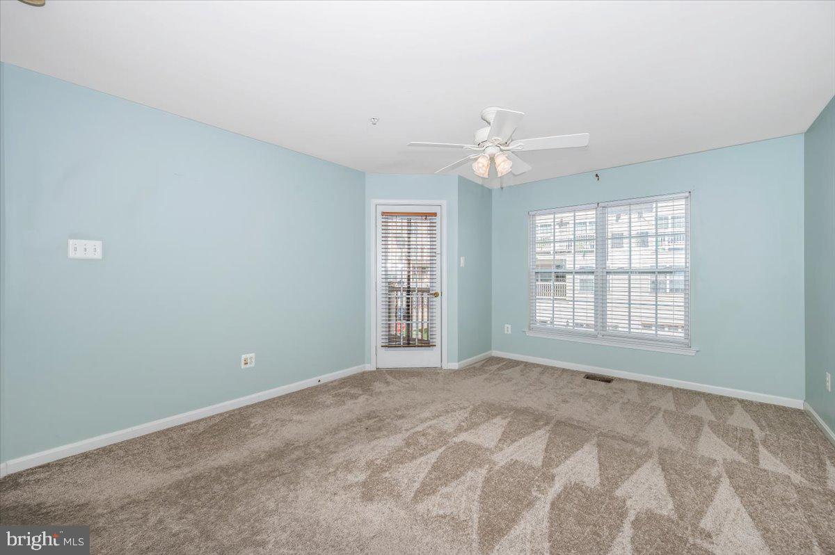 1806 Monocacy View Circle, Unit 41A Frederick, MD 21701 - Photo 27 of 59 a view of an empty room with a window