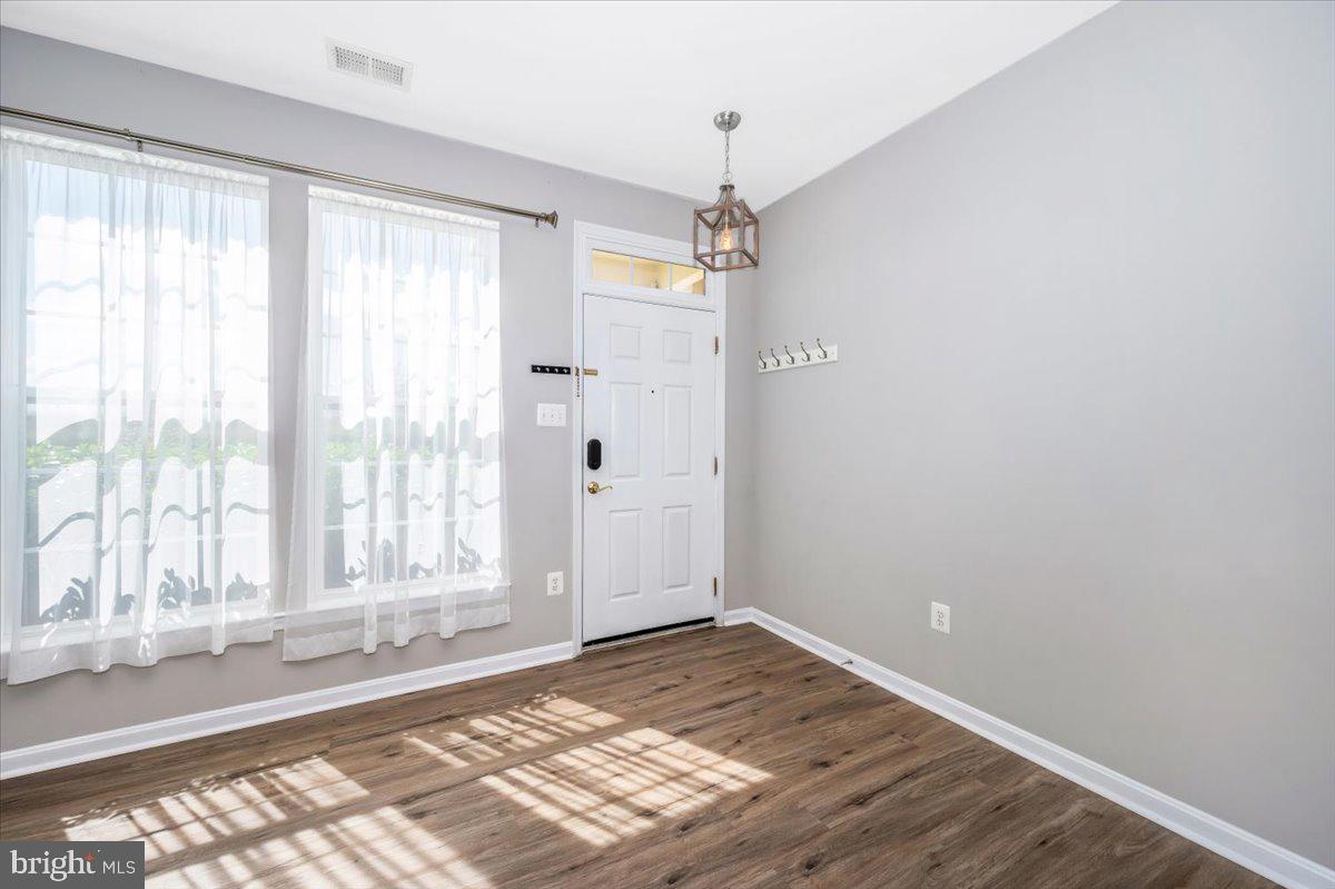 1806 Monocacy View Circle, Unit 41A Frederick, MD 21701 - Photo 3 of 59 a view of an empty room with a window