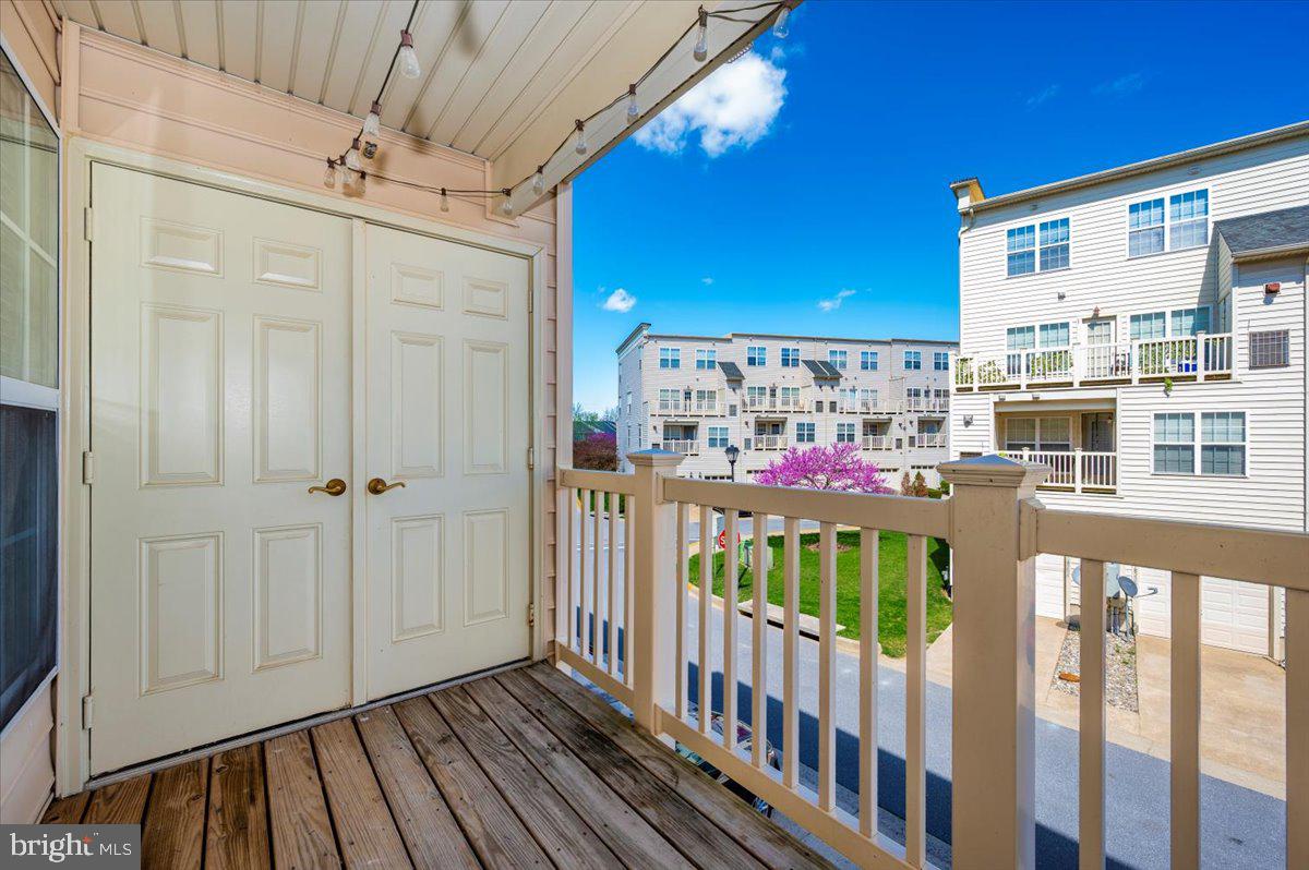 1806 Monocacy View Circle, Unit 41A Frederick, MD 21701 - Photo 34 of 59 a view of a porch with wooden floor