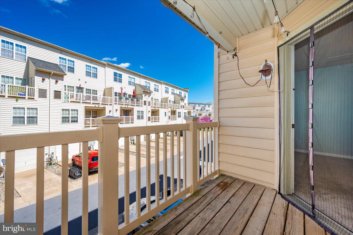 1806 Monocacy View Circle, Unit 41A Frederick, MD 21701 - Photo 36 of 59 a view of a balcony with wooden floor and fence