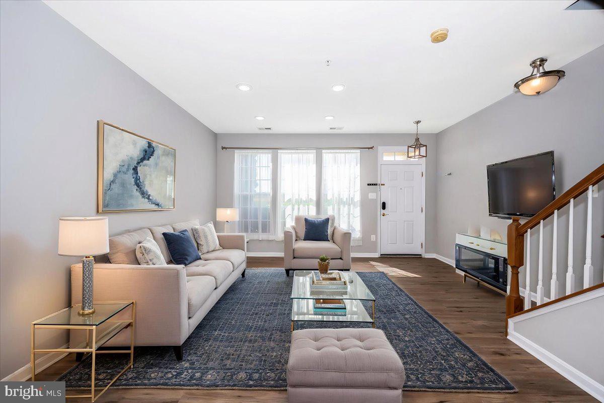 1806 Monocacy View Circle, Unit 41A Frederick, MD 21701 - Photo 4 of 59 a living room with furniture and a rug