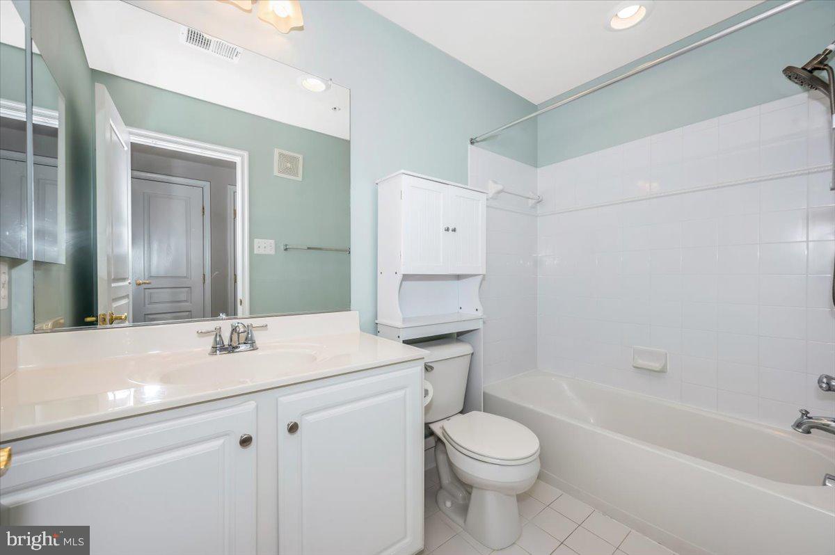 1806 Monocacy View Circle, Unit 41A Frederick, MD 21701 - Photo 45 of 59 a bathroom with a sink a toilet and shower