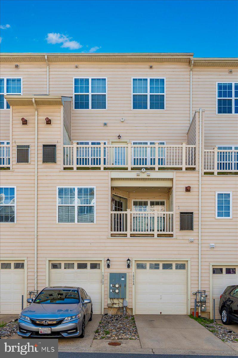 1806 Monocacy View Circle, Unit 41A Frederick, MD 21701 - Photo 47 of 59 a car parked in front of a building