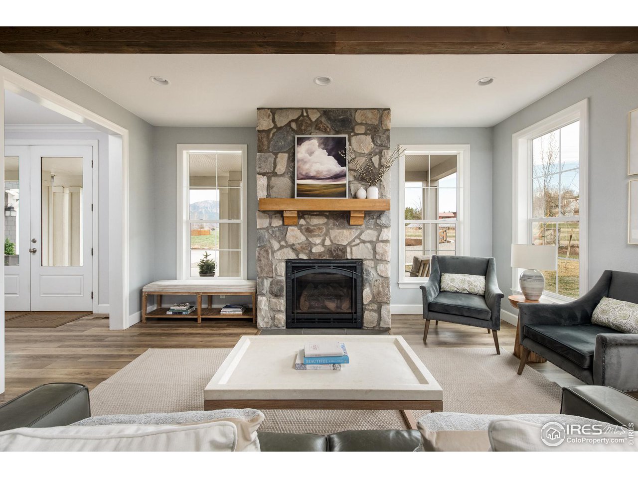 6685 Baseline Road Boulder, CO 80303 - Photo 15 of 38 a living room with furniture and a fireplace