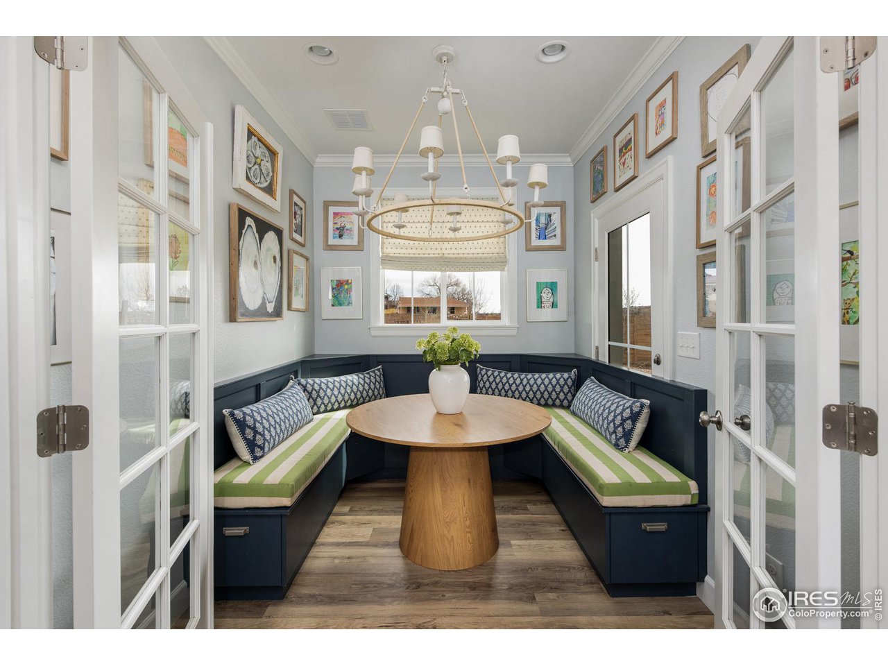 6685 Baseline Road Boulder, CO 80303 - Photo 19 of 38 a living room with furniture and a chandelier