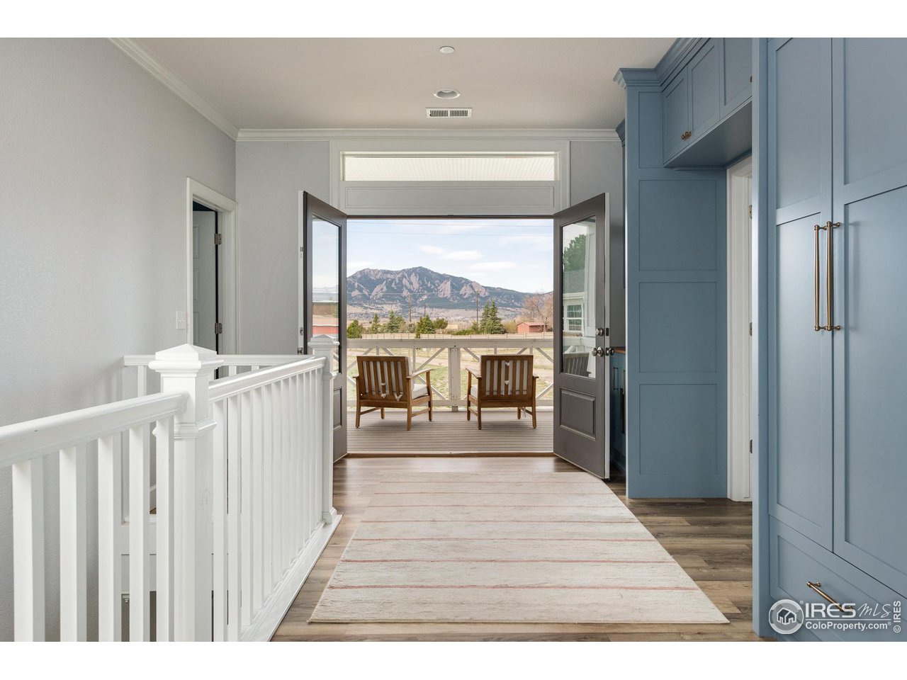 6685 Baseline Road Boulder, CO 80303 - Photo 21 of 38 a room with a bed and a large window
