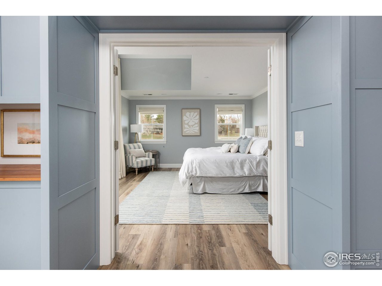 6685 Baseline Road Boulder, CO 80303 - Photo 23 of 38 a bedroom with furniture and a mirror