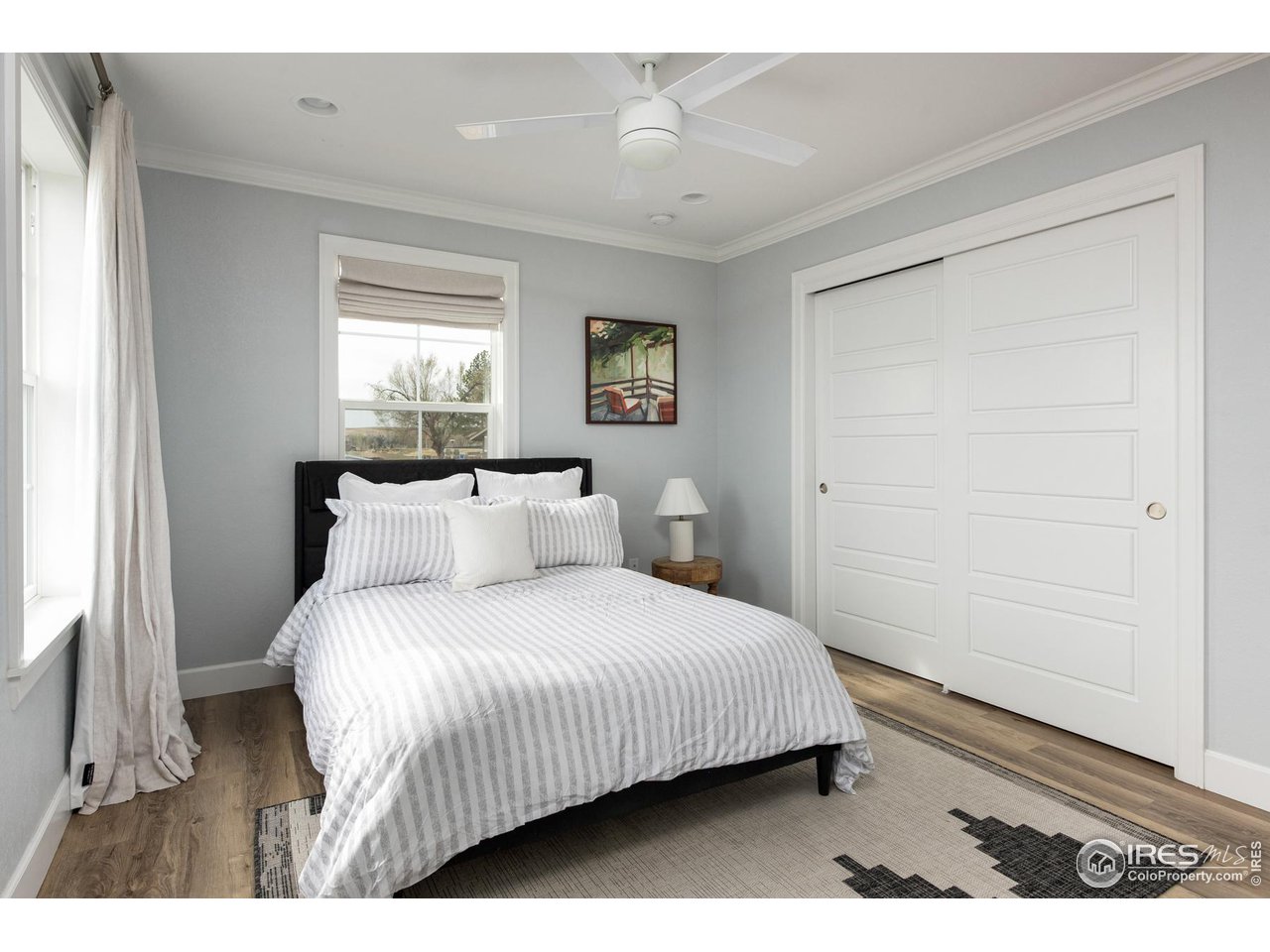 6685 Baseline Road Boulder, CO 80303 - Photo 29 of 38 a bedroom with a bed and a window