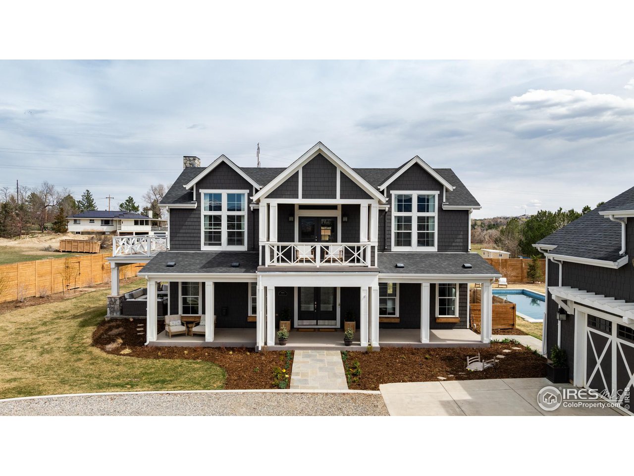 6685 Baseline Road Boulder, CO 80303 - Photo 32 of 38 a front view of a house with a yard