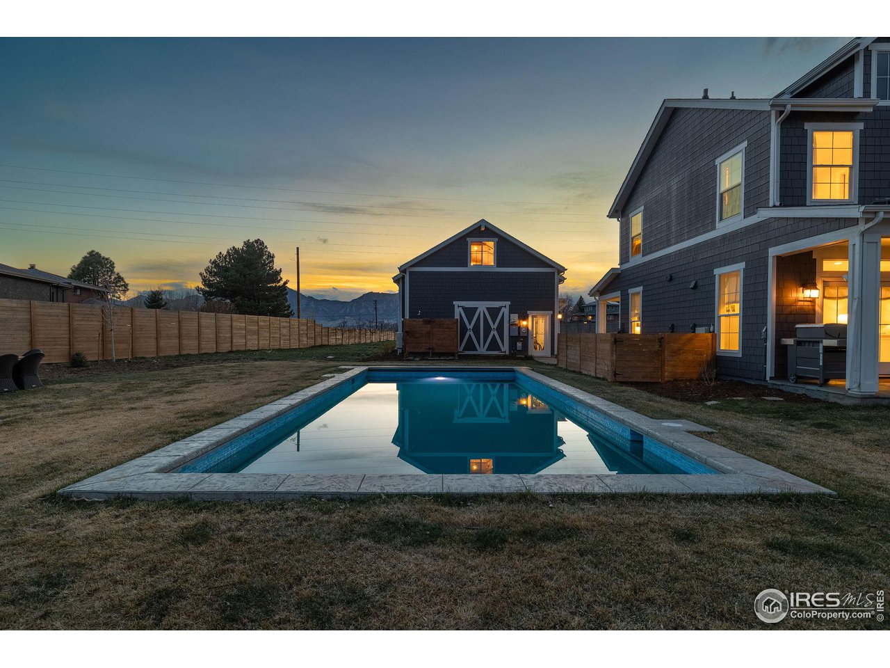 6685 Baseline Road Boulder, CO 80303 - Photo 8 of 38 a living room with pool table and chairs