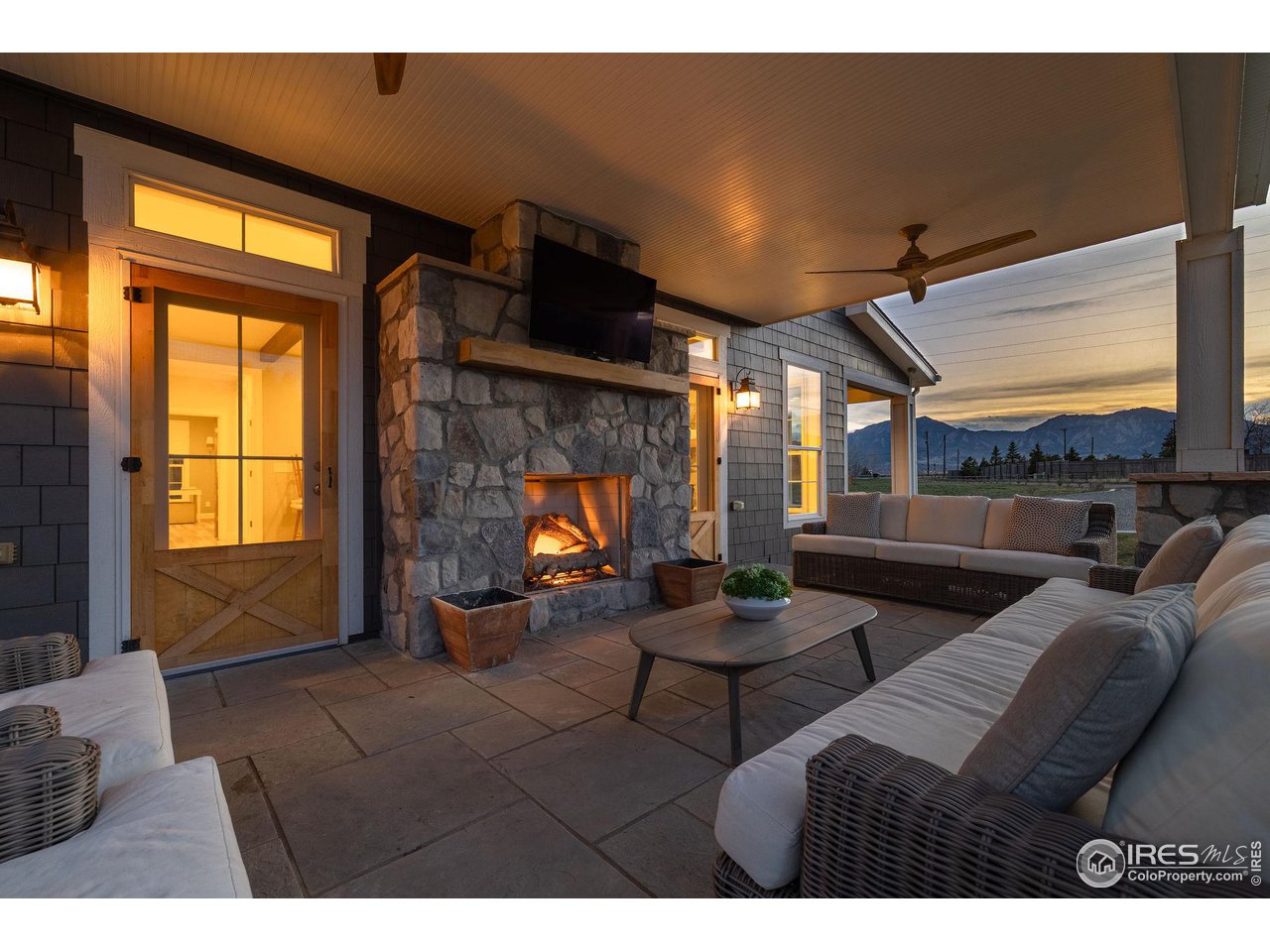 6685 Baseline Road Boulder, CO 80303 - Photo 10 of 38 a living room with furniture and a fireplace