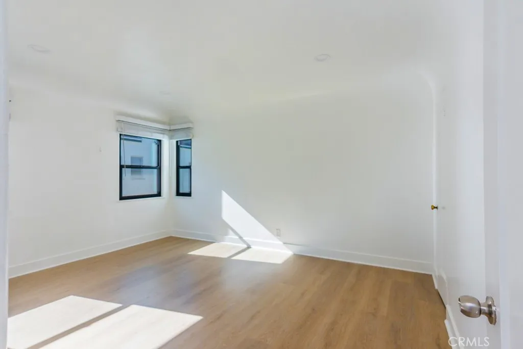 128 South Harper Avenue, Unit 130 Los Angeles, CA 90048 - Photo 31 of 43 a view of wooden floor in an empty room