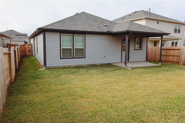a front view of a house with garage