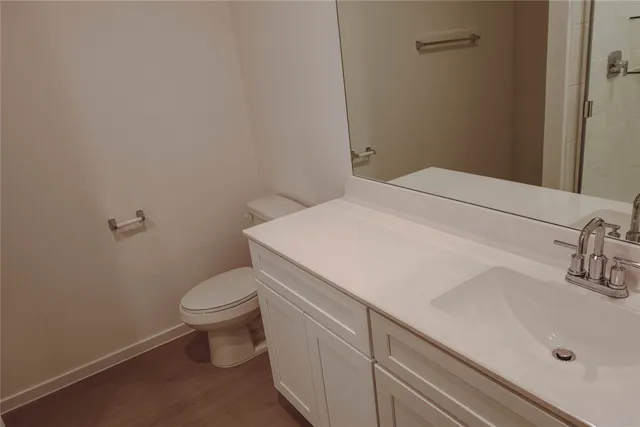 a bathroom with a sink and a toilet