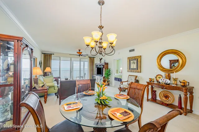 a living room with furniture and white walls