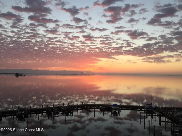 a picture of a bathroom with mirror