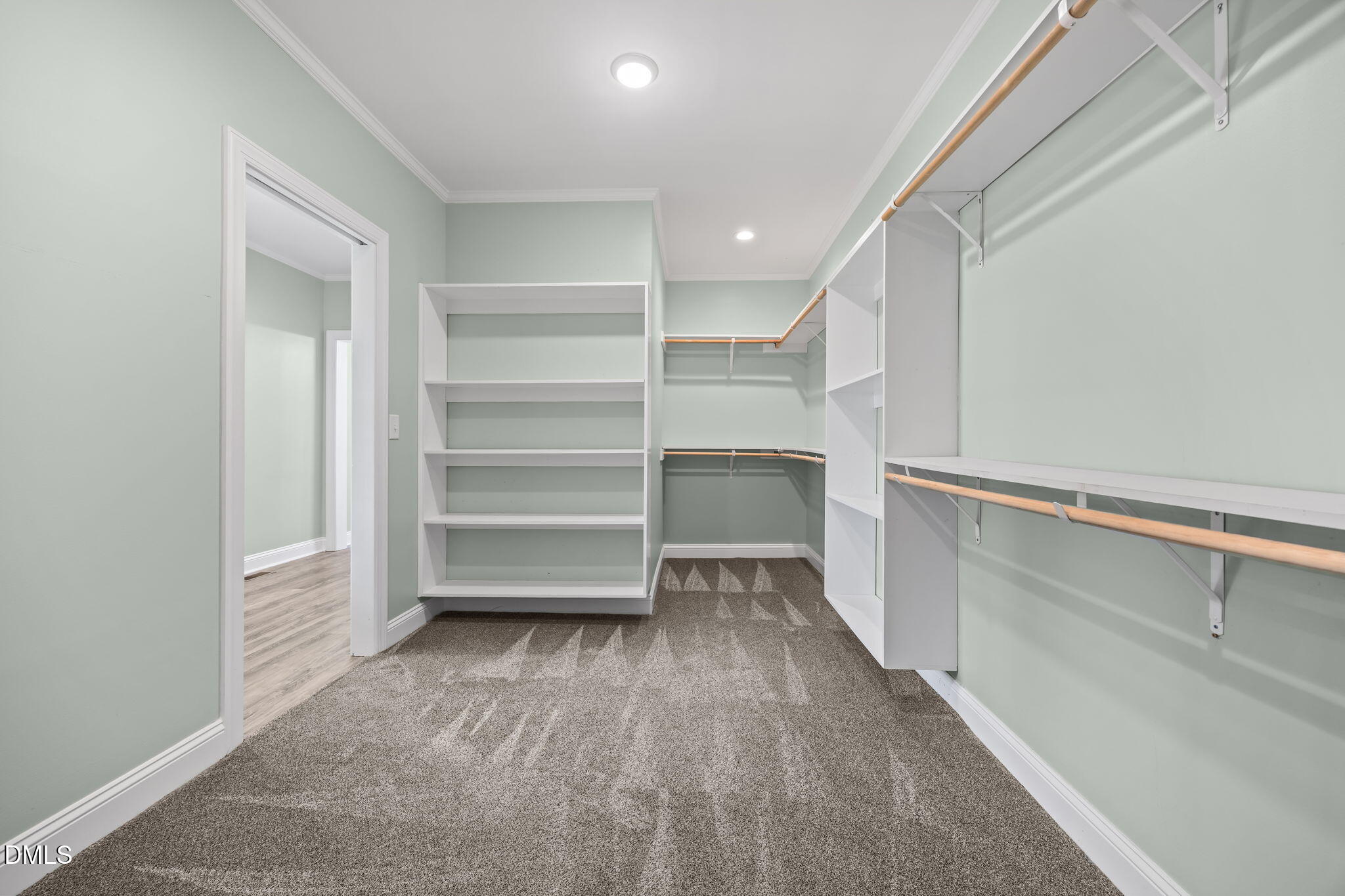 3611 Chewning Road Oxford, NC 27565 - Photo 40 of 45 a view of walk in closet with empty racks