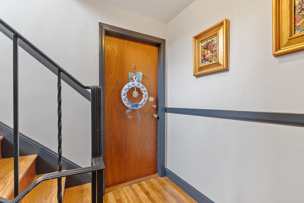 10 Everett Avenue Boston, MA 02125 - Photo 21 of 42 a view of an entryway with wooden floor