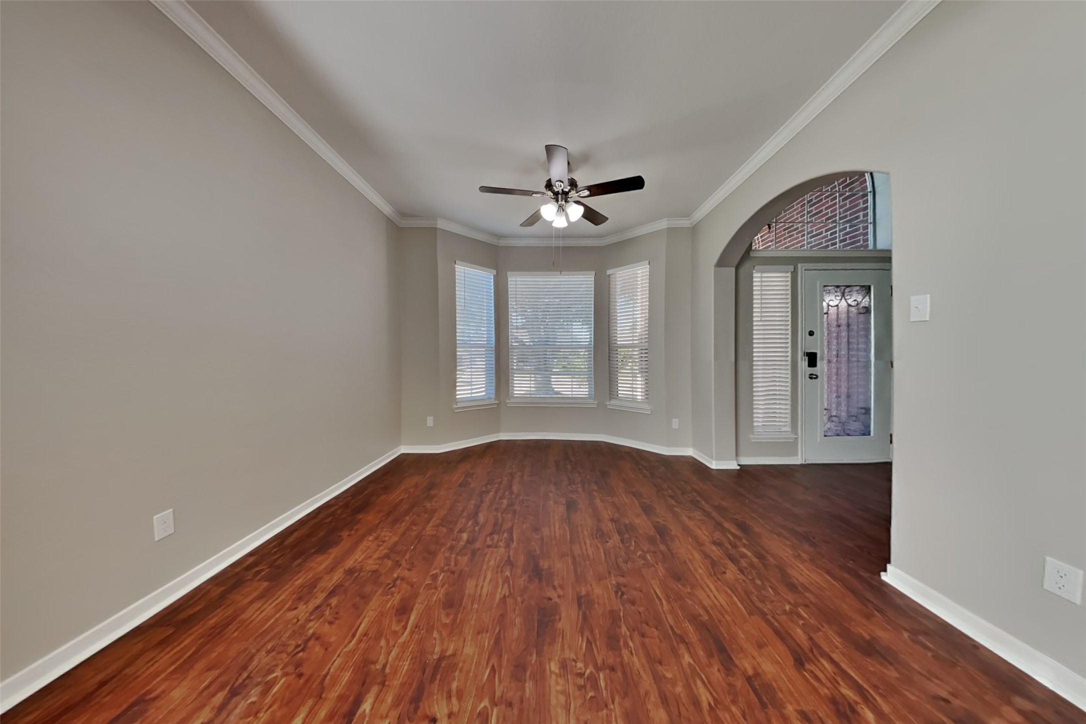 3242 Enchanted Hollow Lane Spring, TX 77388 - Photo 4 of 24 wooden floor in an empty room with a window