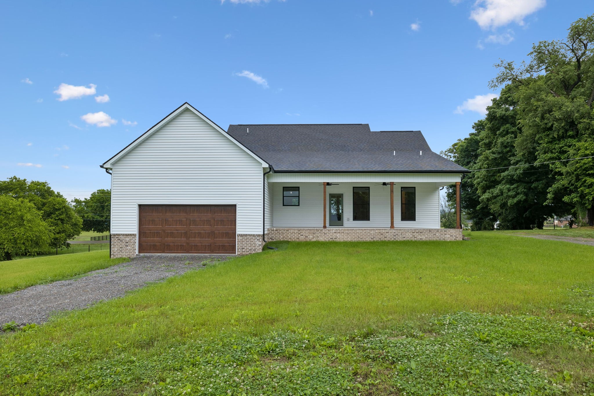 777 Rock Springs Road Castalian Springs, TN 37031 - Photo 46 of 52 a front view of a house with a garden