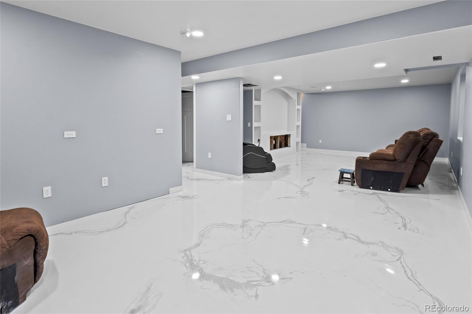 6302 2nd Street Greeley, CO 80634 - Photo 29 of 37 a lobby with a couch and a couch