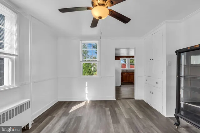 a kitchen with stainless steel appliances granite countertop a stove a sink dishwasher a refrigerator and a microwave