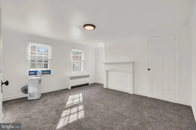 a view of a room with a window