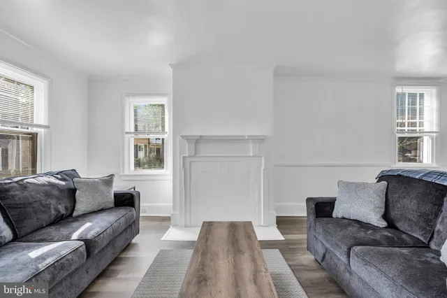 a living room with furniture and a couch
