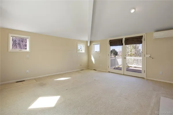 an empty room with windows