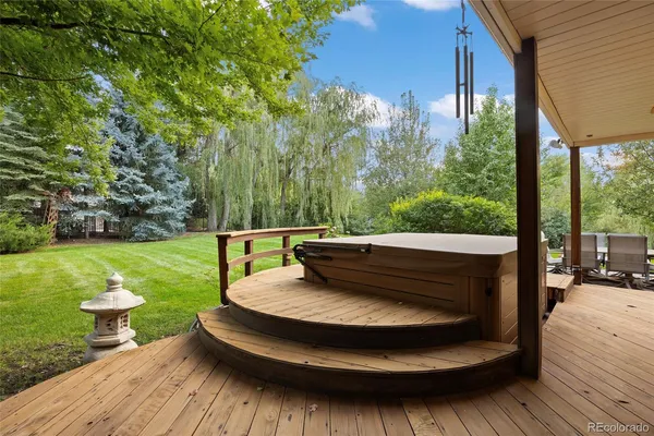 a view of a chairs in patio with a yard