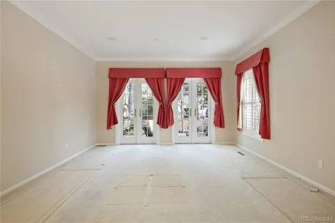an entryway with window and mirror