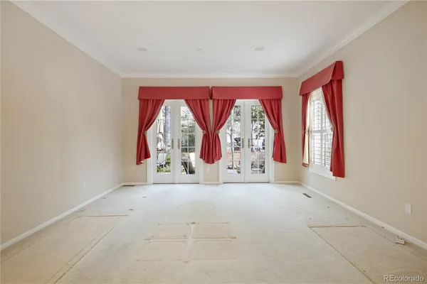 an entryway with window and mirror