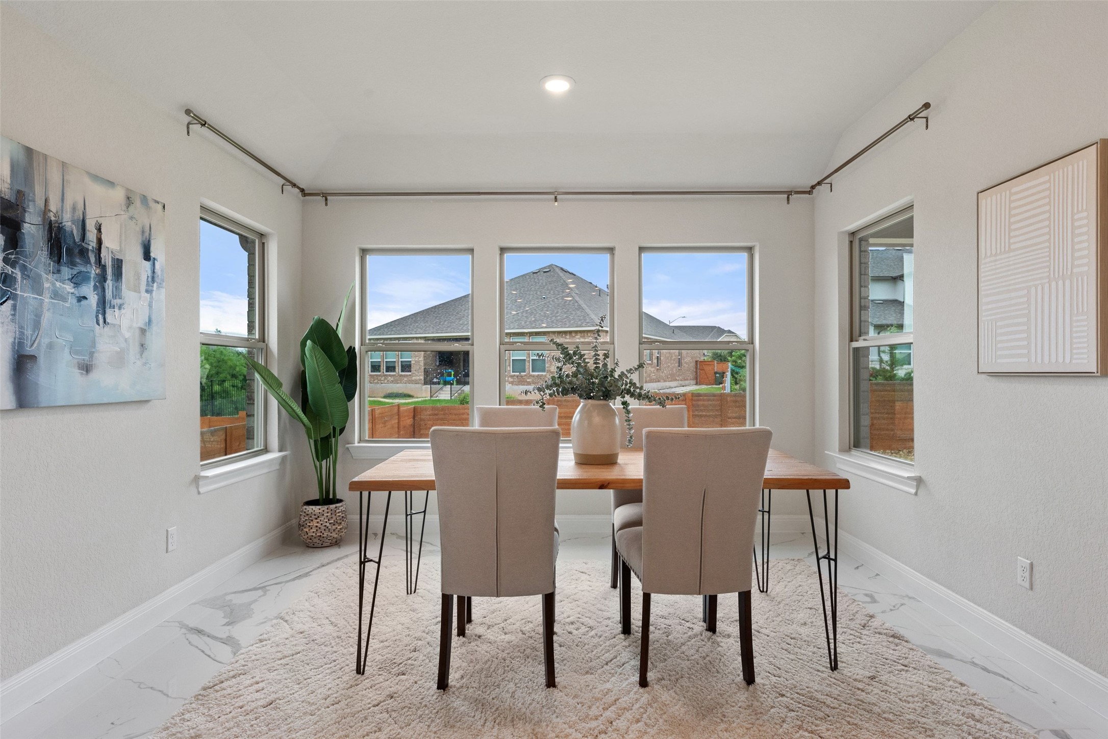 1513 Hinterwald Street Leander, TX 78641 - Photo 15 of 40 a view of a dining room with furniture window and outside view